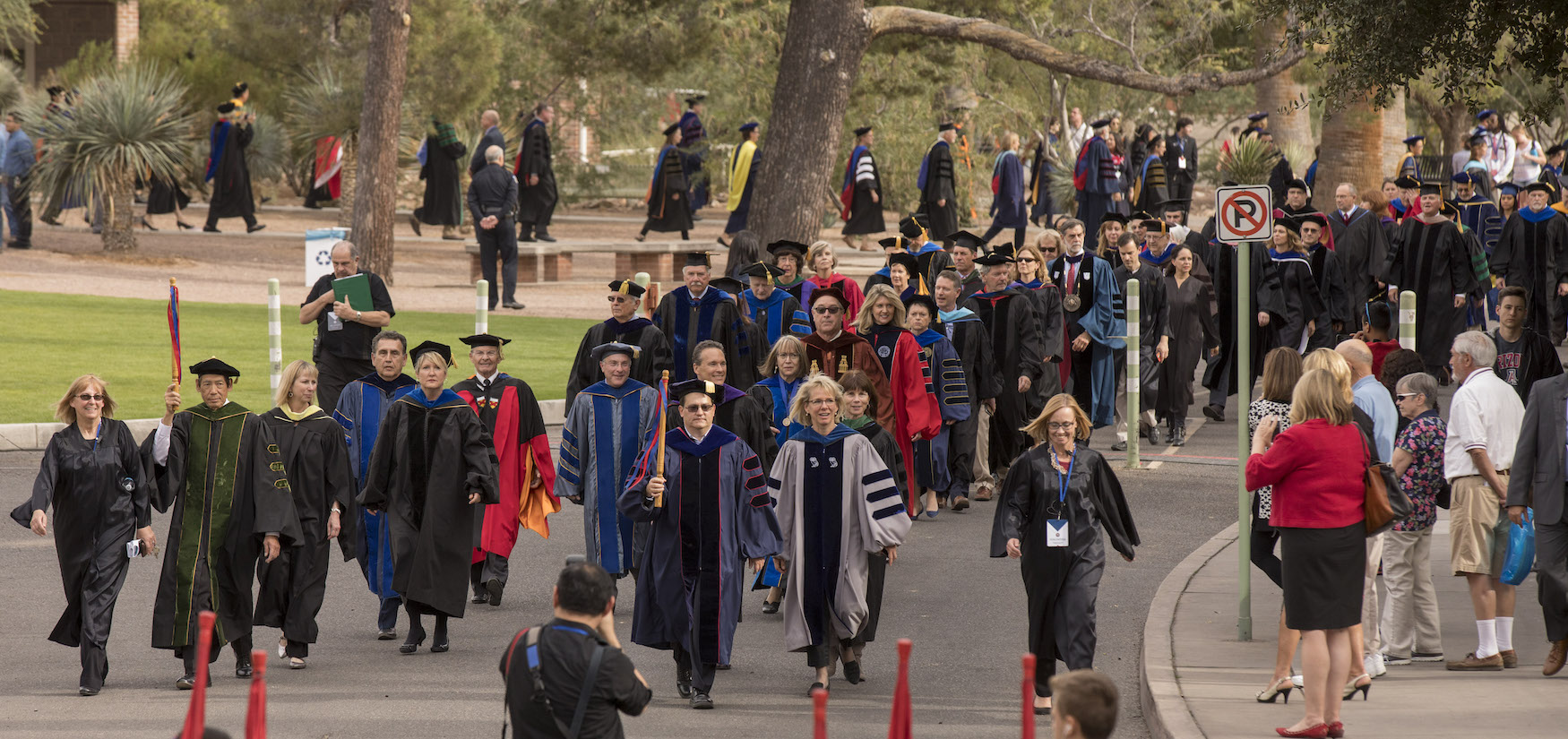 The formal procession heads from Old Main