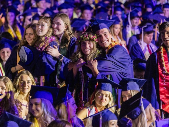 graduates celebrating at commencement