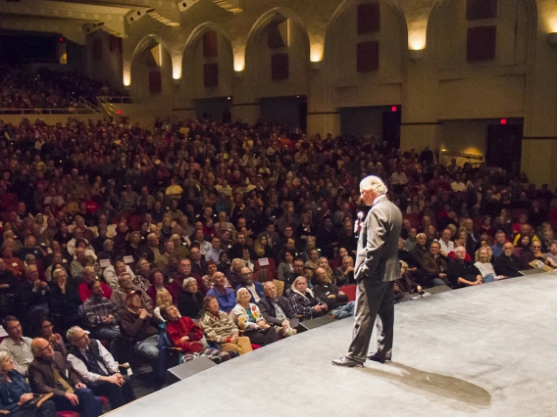 UA President Robert C. Robbins addresses the Centennial Hall audience before the start of Monday night&#039;s science lecture. 